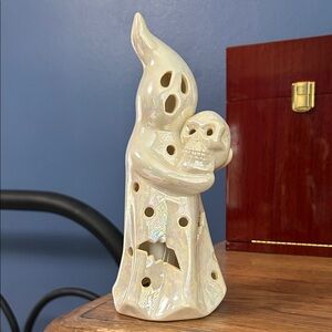 Iridescent Ghost Figurine with Skull